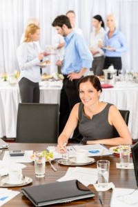 Business woman work during catering buffet